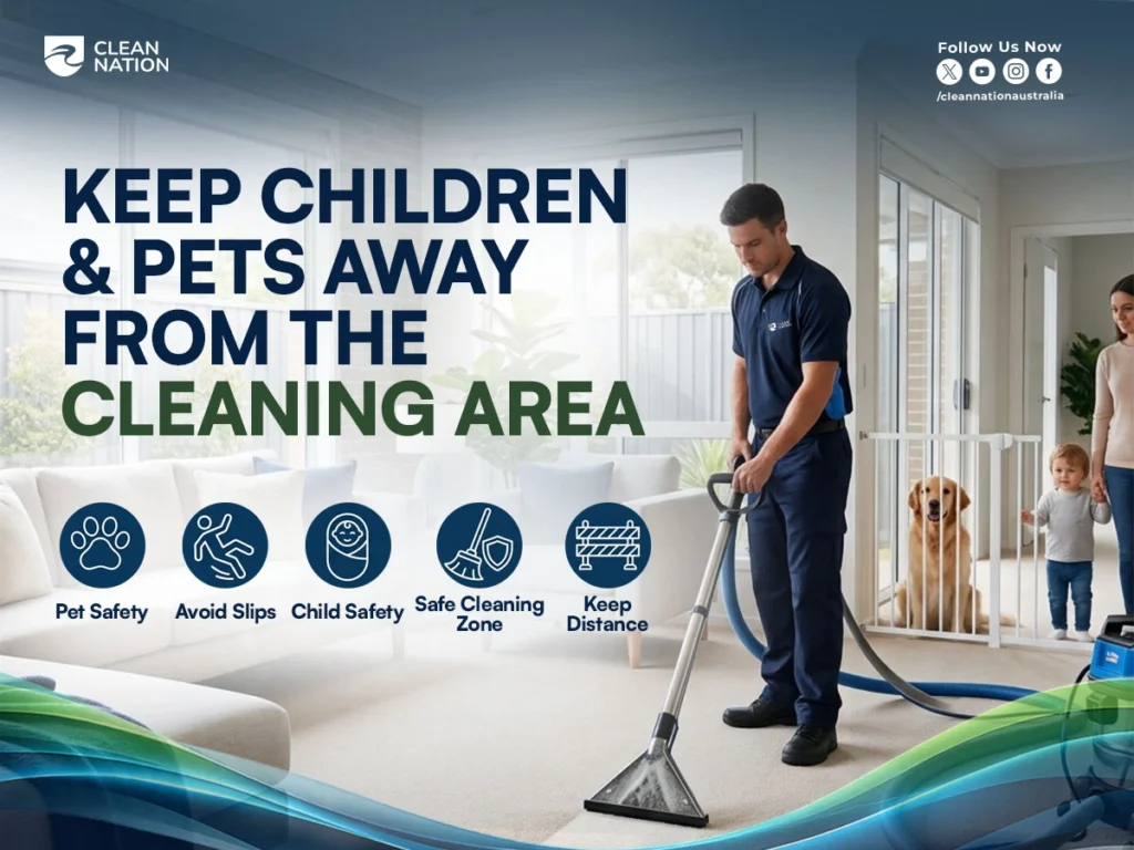 What Should I Do Before Professional Carpet Cleaning? Keep children and pets away from the cleaning area while a professional carpet cleaner uses an extraction machine in a living room, with a child and dog safely behind a baby gate to ensure a safe cleaning environment.