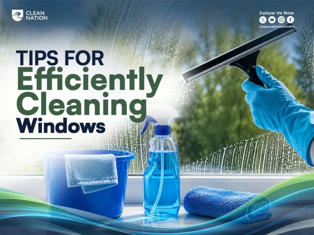 A person wearing a blue glove uses a squeegee to clean a large window with a spray bottle, bucket, and microfiber cloth nearby, illustrating Tips for Efficiently Cleaning Windows for achieving a streak-free, sparkling finish.