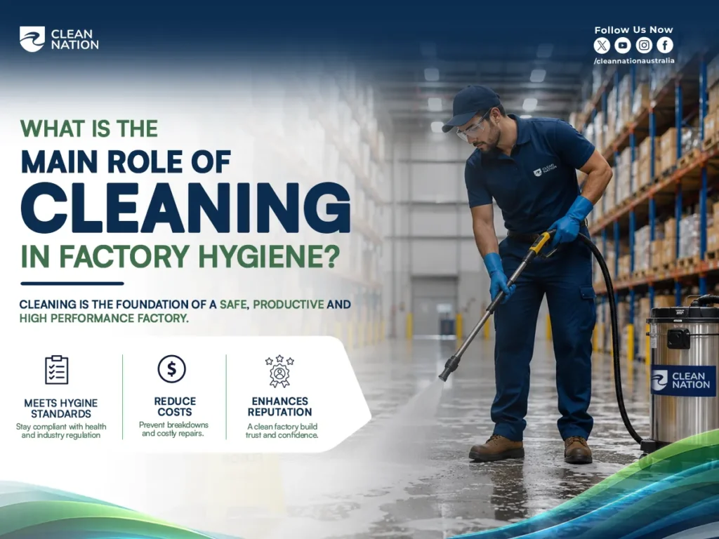 A factory worker uses an industrial vacuum to clean a warehouse floor, illustrating What Is the Main Role of Cleaning in Factory Hygiene? by highlighting how regular cleaning supports hygiene standards, reduces maintenance costs, and enhances workplace safety and business reputation.
