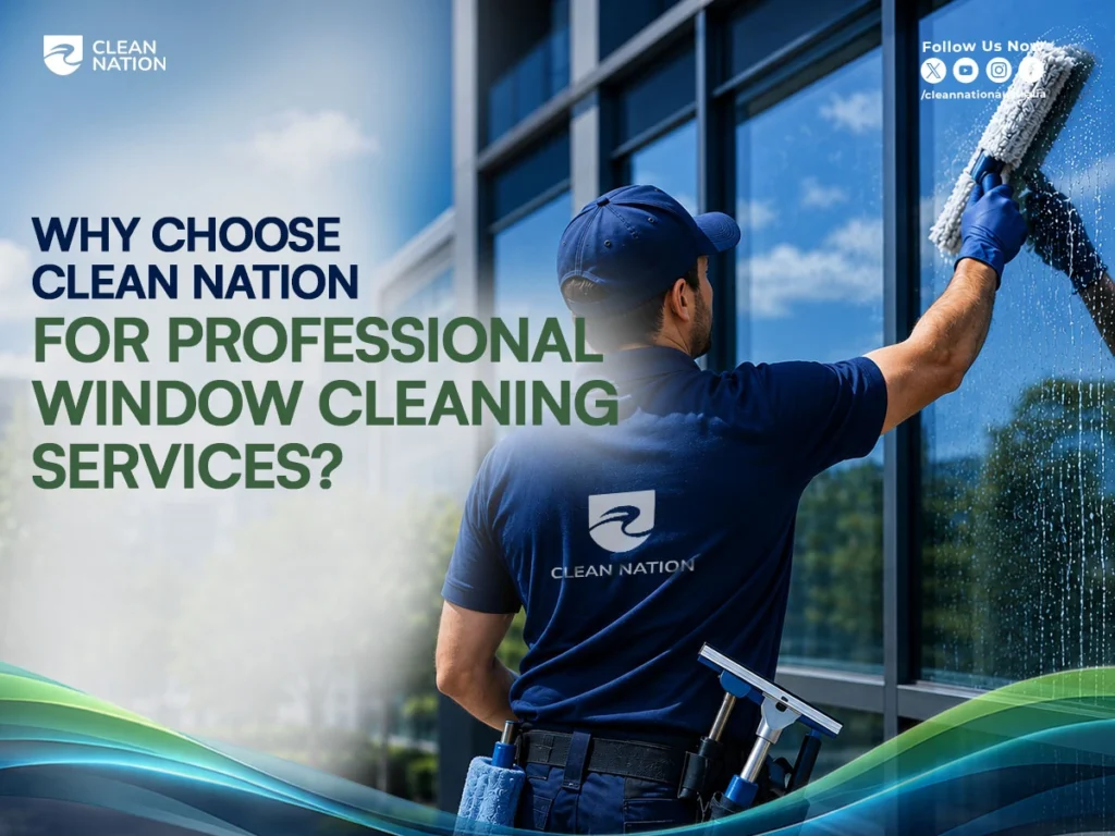 A Clean Nation technician cleans large commercial building windows with professional window cleaning tools, highlighting Why Is It Important to Hire Professional Window Cleaning Services? to achieve spotless, streak-free windows safely and efficiently.