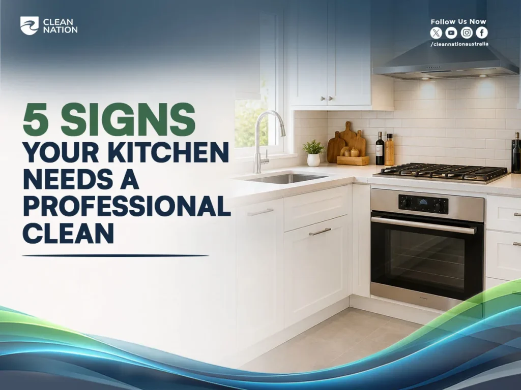 5 Signs Your Kitchen Needs a Professional Clean shown on a promotional graphic featuring a bright, modern white kitchen with cabinets, sink, tiled backsplash, stovetop, oven, and range hood, with Clean Nation branding and colorful wave accents at the bottom.