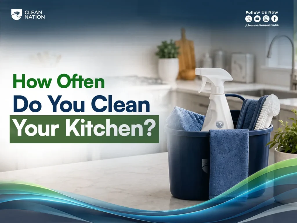 How Often Do You Clean Your Kitchen? A clean kitchen countertop with a bucket of cleaning supplies, spray bottle, brushes, and towels, highlighting regular kitchen cleaning and hygiene.