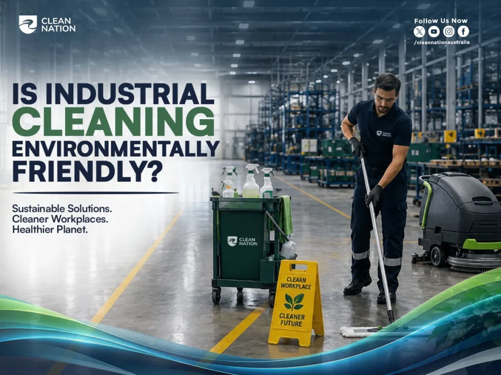 A professional cleaner mops the floor of a large industrial warehouse beside a floor scrubber and eco-friendly cleaning supplies, highlighting sustainable cleaning practices. The image answers the question, Is industrial cleaning environmentally friendly?, by showcasing environmentally responsible equipment and products that support cleaner workplaces and a healthier planet.