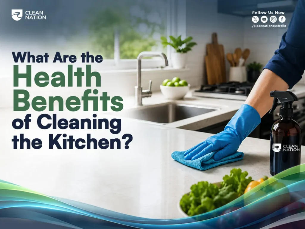 A person wearing blue cleaning gloves wipes a modern kitchen countertop with a microfiber cloth beside a spray bottle, with a clean sink, fresh vegetables, and bright natural light in the background. This image highlights the Health Benefits of Cleaning the Kitchen by promoting a hygienic, germ-free, and healthy cooking environment.