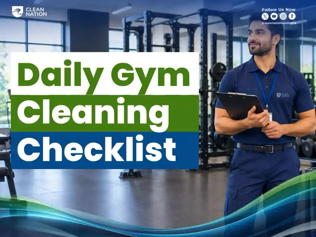 Clean Nation team member holding a clipboard in a gym with the daily gym cleaning checklist