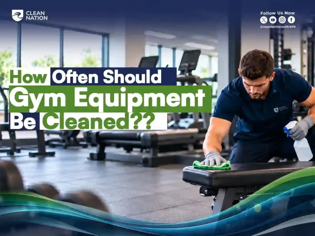 Clean Nation cleaner spraying and wiping down a gym bench to show how often gym equipment should be cleaned