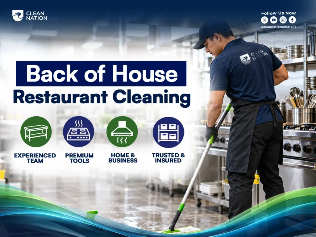 Clean Nation cleaner mopping a commercial kitchen floor beside stainless steel cooking equipment for back of house restaurant cleaning